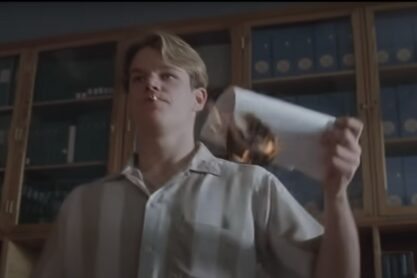 Frame from the movie Good Will Hunting showing Matt Damon holding up a burning piece of paper.